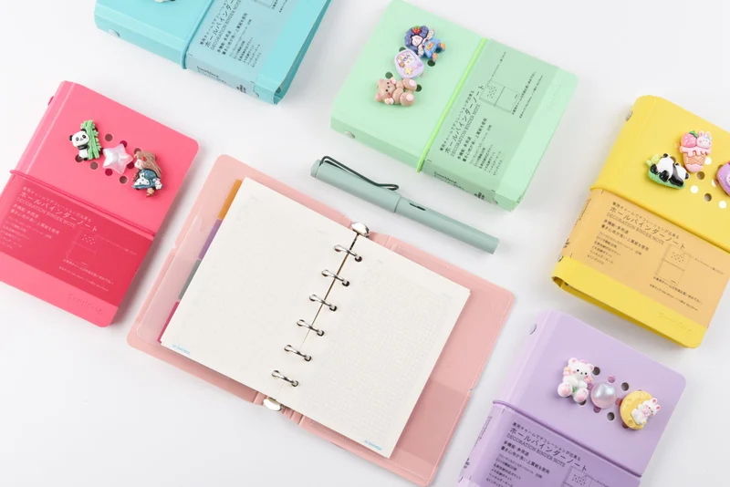 Sworld Notebook ME, A6, with 6 rings, elastic, white sheets, 40 sheets, purple